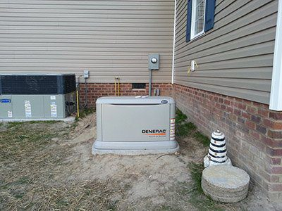 Generac Generator outside of a house.